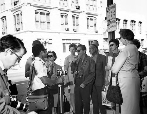 Group with cameras on Main Street