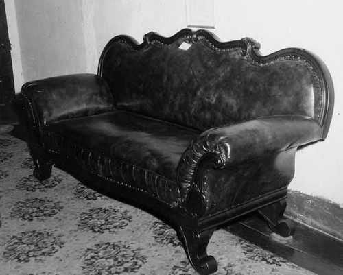 Leather covered sofa in Avila Adobe