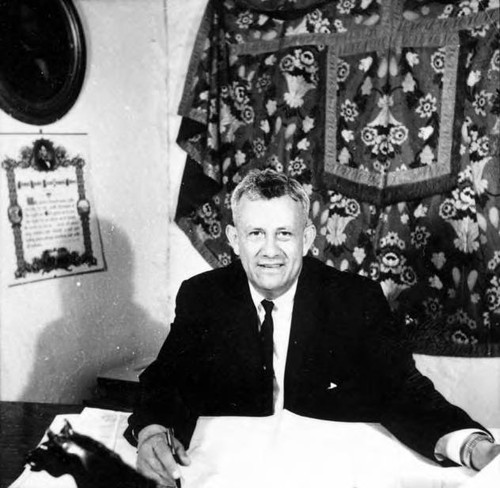 Mario Valadez sitting at a desk