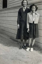 Mrs. Quan Ying with daughter Beverly Quon around age 9. Christmas party at Mrs. Quan Ying's house at 722 East 9th Place in Los Angeles