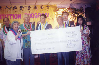 CCOA Nutrition program, Hawaiian Day, in which Cathay Bank of Los Angeles presented the Chinese Committee a check. Lily Chan was the vice president of the board of the Los Angeles CCOA