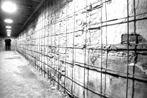 Photograph of the supporting wall for the Pico House