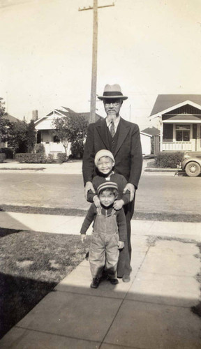 Gilbert and Ronald Siu with their grandfather