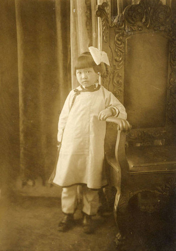 Postcard of Dorothy Siu as a young girl. On the back of the photo "Dorothy" is written on the right side and "Anna Ching" on the left