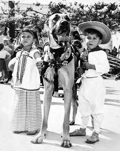 Boy and girl with big dog at Blessing of the Animals