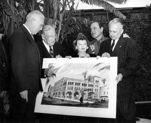 Christine Sterling holding plans for Biscailuz Building, surrounded by four men