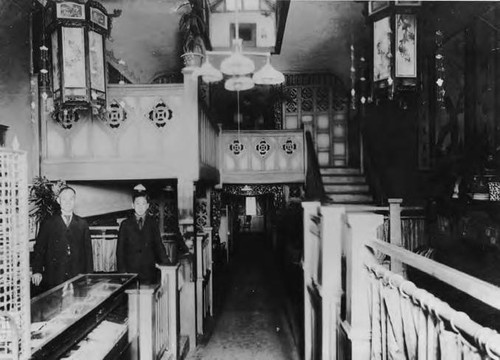 George C. Lem on the left inside of Lem's Cafe