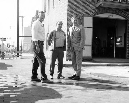 William Probert with two men by the firehouse