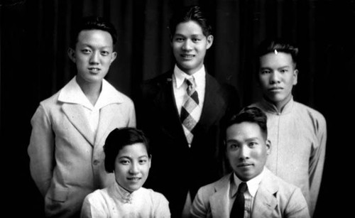 Arthur Chung and three men and a girl