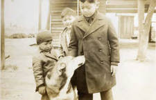 Three young boys and a dog, when Flo and Rodney brought Mrs. de Lima down on a tour of southern California