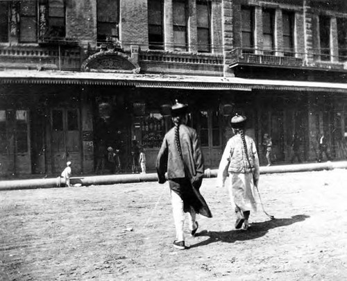 Chinese walking towards Garnier on N. Los Angeles Street