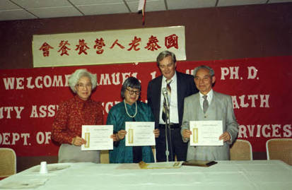 Welcoming Dr. Samuel Lin, the United States Assistant Secretary for Health of the Department of Health and Human Services. Lily Chan stands in the middle