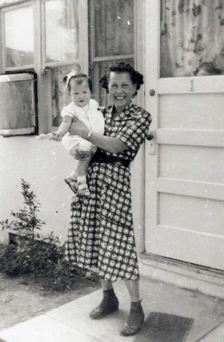 Photo of a woman holding a baby