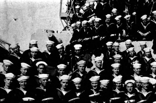 Close up of Chow Hoy in group shot of crew in the U.S. Navy