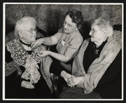Mrs. Joseph Eiley Thane and Mrs. Anna B. Haley Receiving a Pioneer Medal