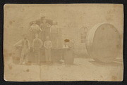 Men by Big Barrel at Gallegos Winery