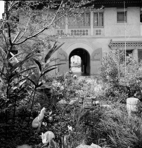 View of courtyard garden at Grace Nicholson's Treasure House, looking toward street