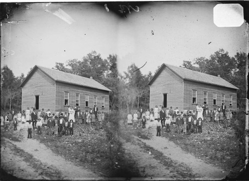 Cherokee District school house and scholars, Tahlequah, 1879