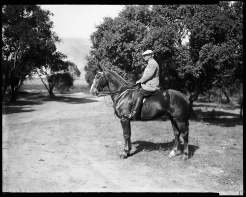 Senator Frank P. Flint on a horse. 1925