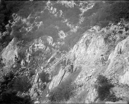 Construction workers widening the toll road below the Pasadena Gap, San Gabriel Mountains