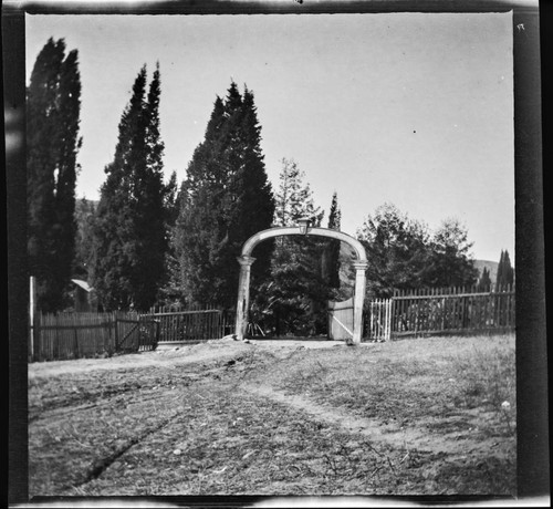 Unidentified gated entry and fence