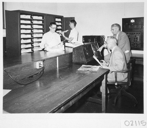 Rudolph Minkowski, Ira Sprague Bowen, James McClanahan and Hendrik Rubingh, Palomar Observatory