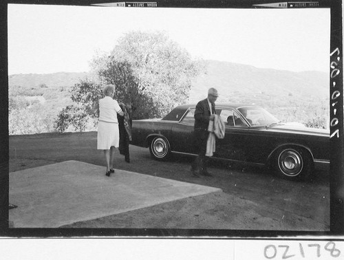 Lee A. Dubridge and Mrs. Dubridge arriving at the dedication of the 60-inch telescope, Palomar Observatory