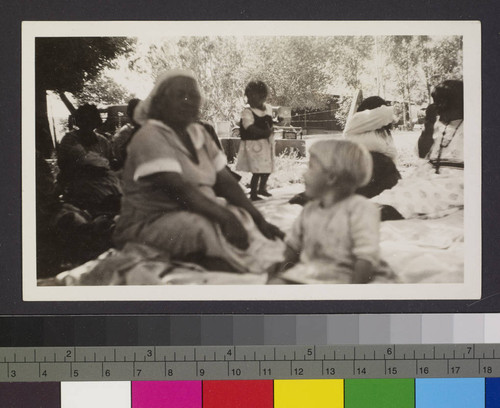 Women and children at picnic