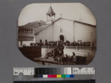 People gathered in front of Mission San Luis Obispo de Tolosa