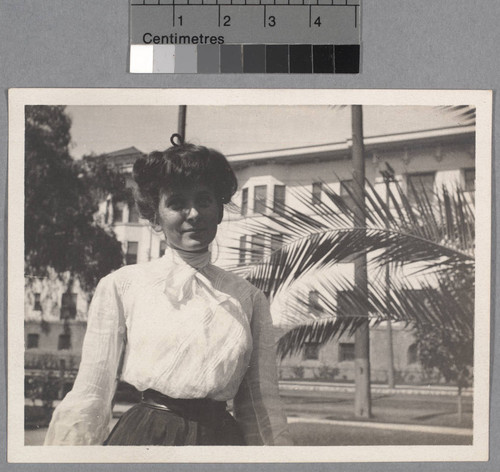 Grace Nicholson in Pasadena, with Hotel Maryland in background