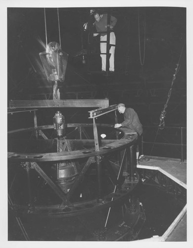 Cassegrain cage being attached to the telescope tube, 100-inch Hooker telescope, Mount Wilson Observatory