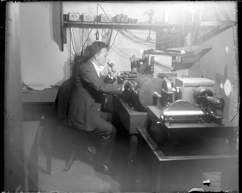 Olin Wilson at the microphotometer, Mount Wilson Observatory