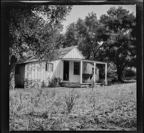 Unidentified house with hammock on porch