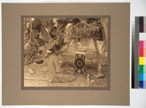 Navajo woman weaving blanket, Jeddito Springs, Arizona