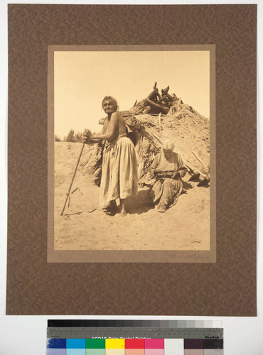 Navajo old women and their hogan or home, Chinle Desert, Arizona