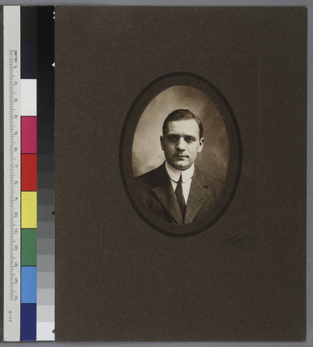 Studio portrait of Edwin Powell Hubble, in oval frame