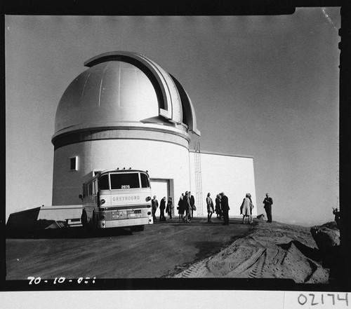 Guests arriving by bus for the dedication of the 60-inch telescope, Palomar Observatory
