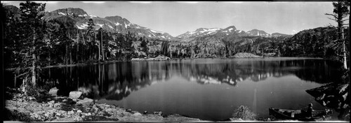 Lake with mountains. approximately 1910