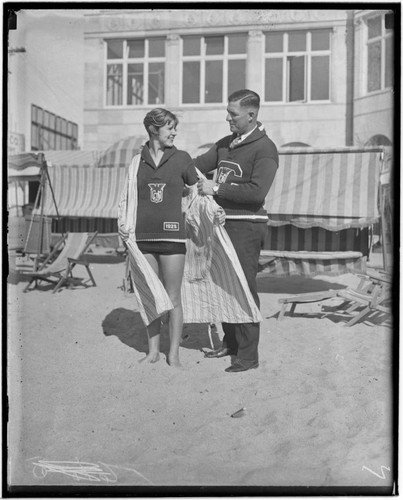 Lily May Bowmer with coach Frank Holborrow on the beach at Club Casa del Mar, Santa Monica, California