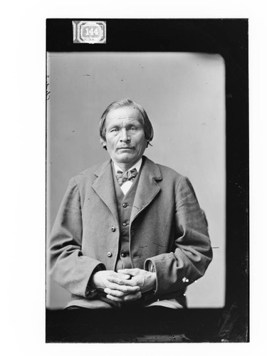 Portrait of Oshawashkogijig, member of Chippewa/Ojibwe Delegation to Washington D.C., ca. 1880