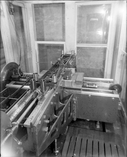 Ruling machine in the basement of Hale Observatories' office building, Pasadena