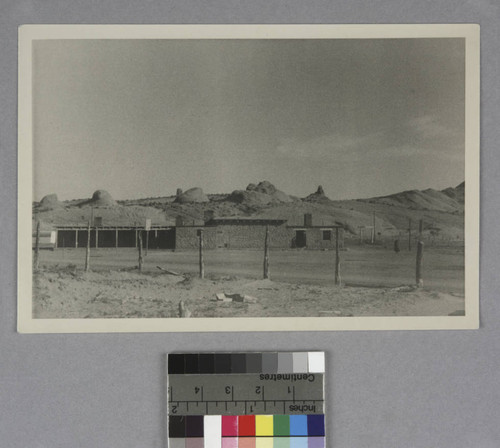 Adobe buildings and rock outcroppings, Kayenta, Arizona