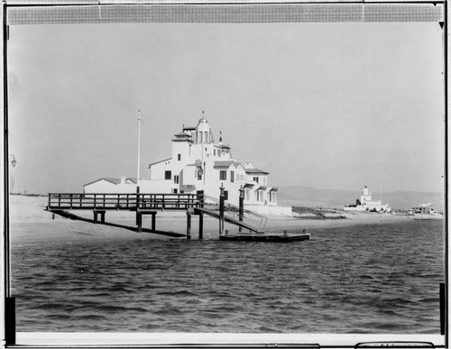 Lido Isle beach, pier, and buildings, Newport Beach. approximately 1930