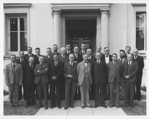 Group portrait of the Mount Wilson Observatory research staff, posed in front of the Mount Wilson Observatory office building, Pasadena