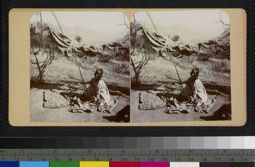 Mono woman with basket in her hands, Owens Valley, California