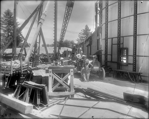 Construction workers with main girder on truck, Mount Wilson Observatory