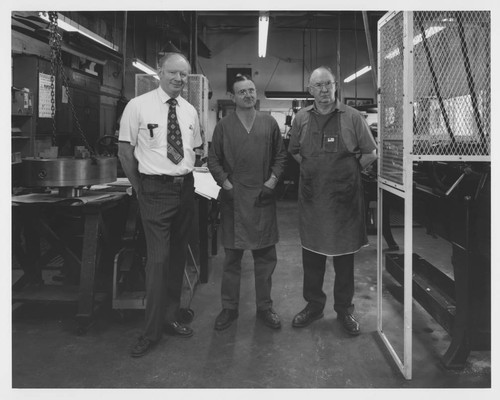Rudolf Ribbens, Stephen Doro, and Fred O'Neil in the Mount Wilson Observatory's machine shop, Pasadena