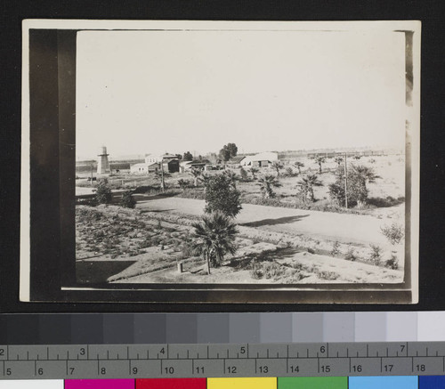 Unidentified buildings and water tower