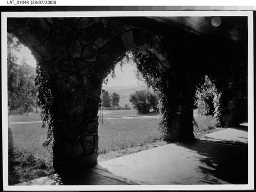 View out through arches onto Vermejo lodge grounds