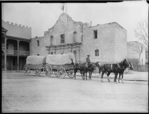 San Antonio. The Alamo and two freight wagons